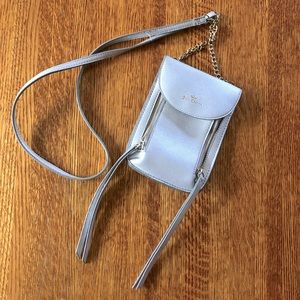 Juicy Couture silver crossbody phone purse.